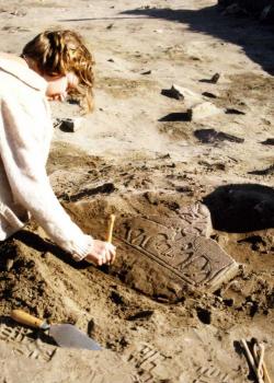 Portmahomack; Kate excavating the 'Calf Stone'